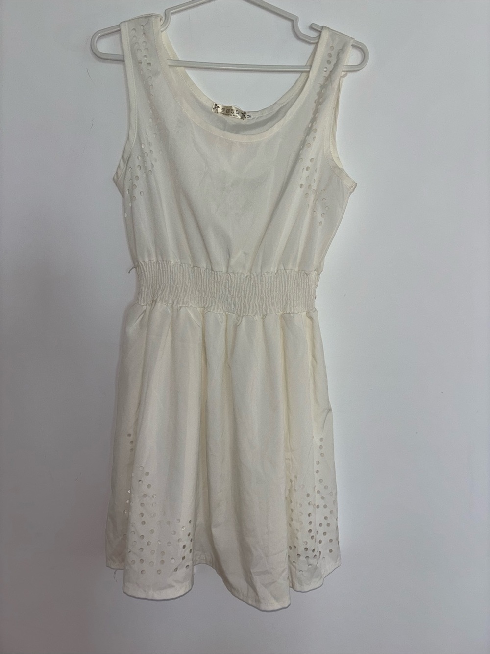 Sleeveless Cream Smocked-Waist Casual Dress